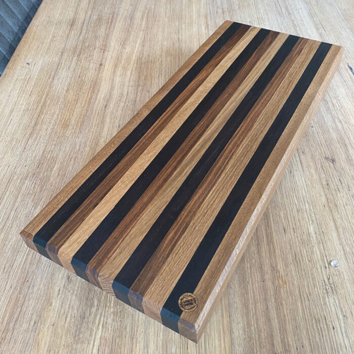 saw and pout oak and walnut chopping board